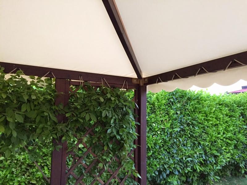 FISSAGGIO DEL TELO INTERNAMENTE CON CORDA E BOTTONI